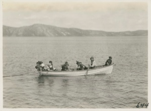Image: Katie Hettasch and scholars in boat